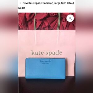 Kate Spade blue leather slim bifold wallet